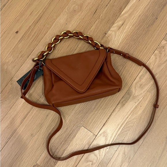 Vince Camuto Lyona leather convertible cross body clutch...